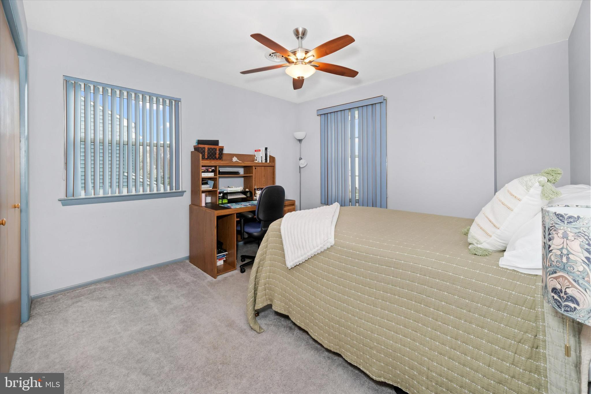 710 Fox Chase Circle Bear, DE 19701 - Photo 34 of 55 a bedroom with a bed and a book shelf