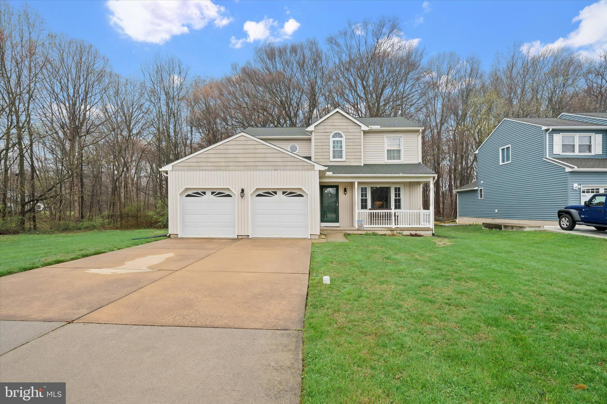 710 Fox Chase Circle Bear, DE 19701 - Photo 4 of 55 a front view of a house with garden