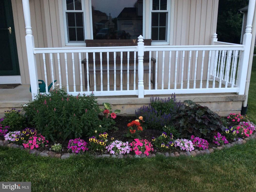 710 Fox Chase Circle Bear, DE 19701 - Photo 7 of 55 a view of a flowers in front of a house