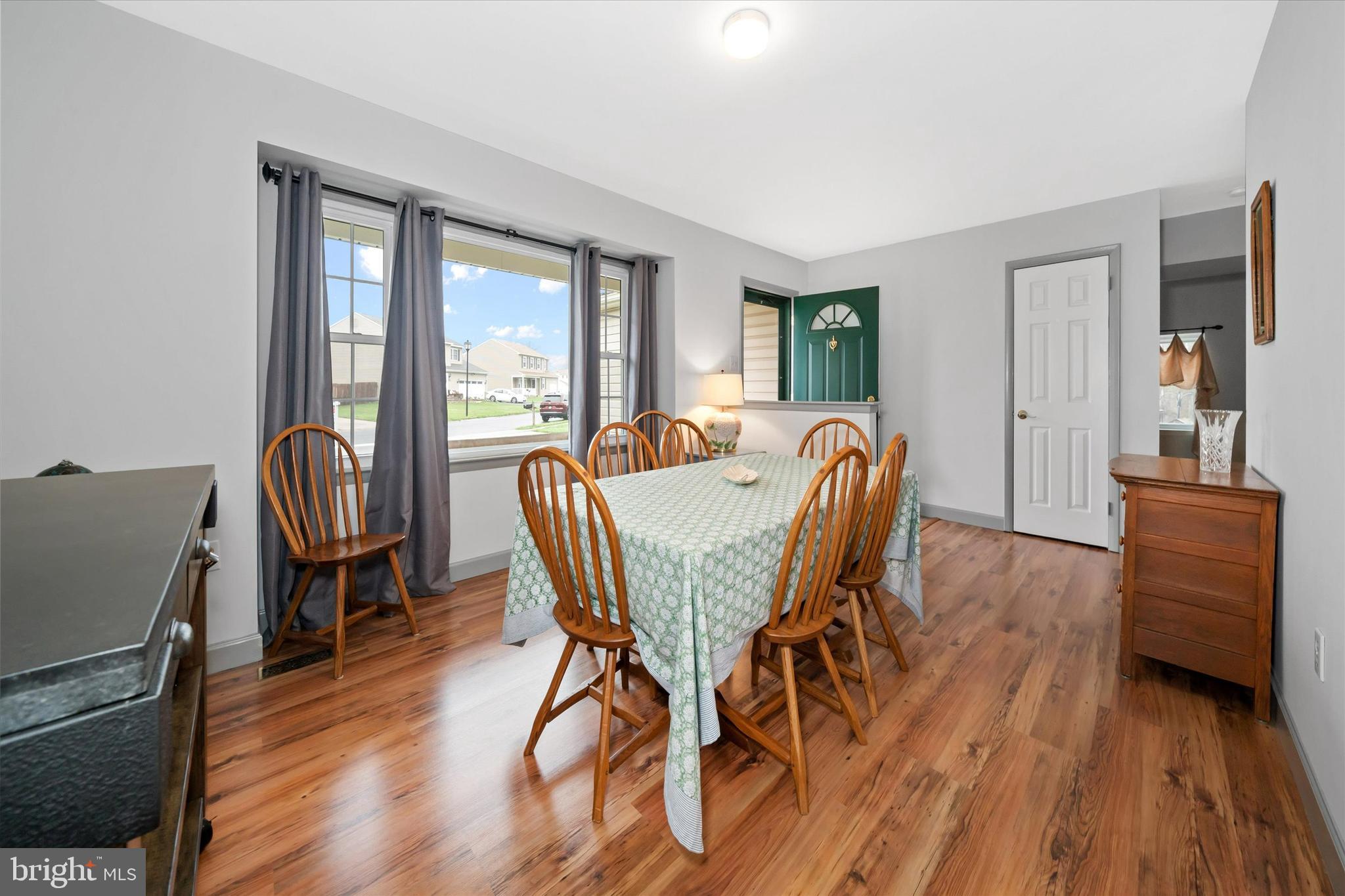 710 Fox Chase Circle Bear, DE 19701 - Photo 10 of 55 a view of a dining room with furniture window and wooden floor