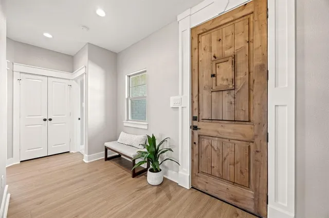 a large kitchen with stainless steel appliances granite countertop a sink counter space a stove a sink and a refrigerator