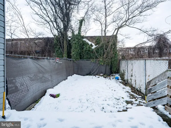 a view of a backyard of the house