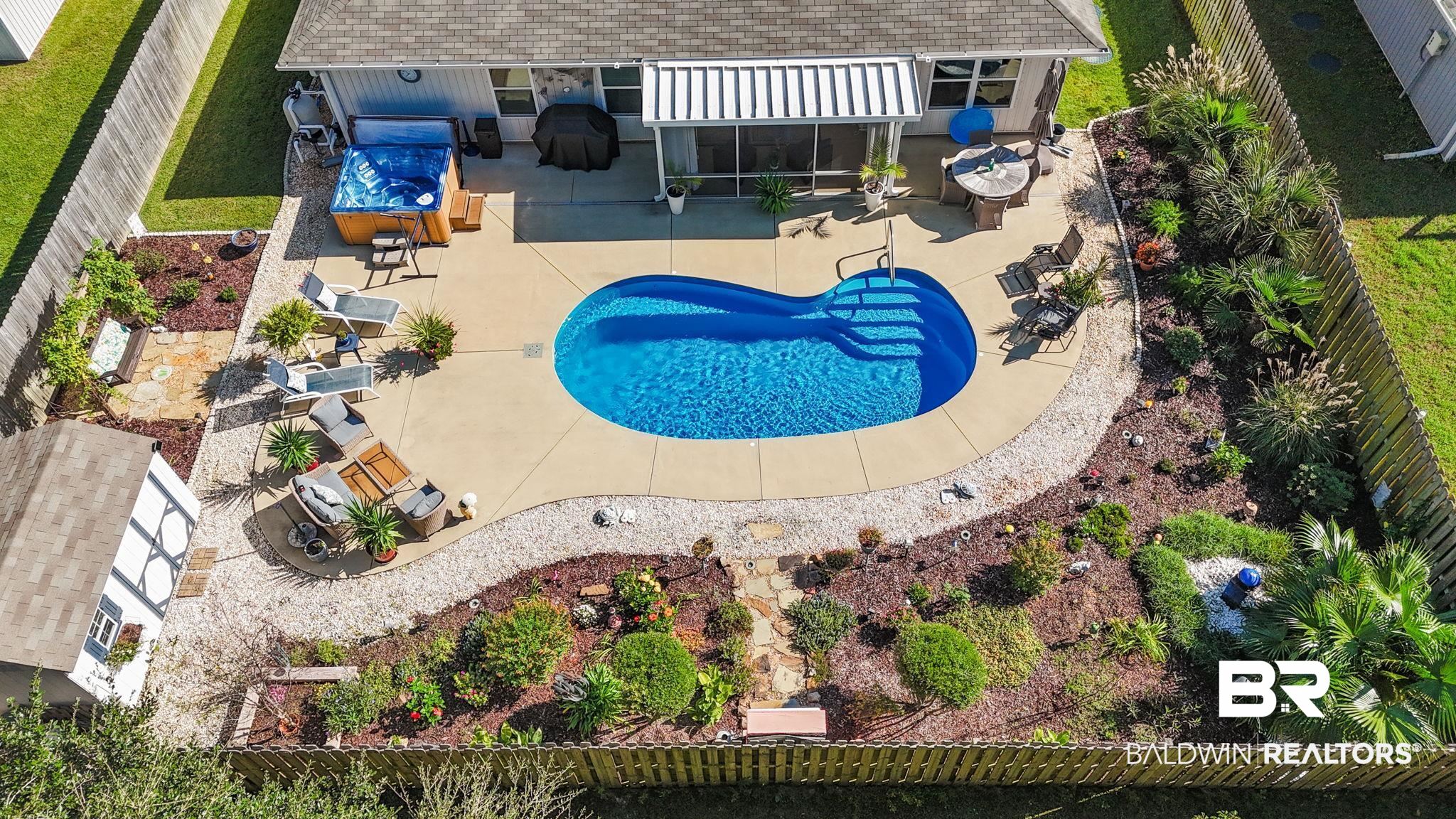 345 Hartenstein Road Foley, AL 36535 - Photo 46 of 47 View of swimming pool featuring a patio area