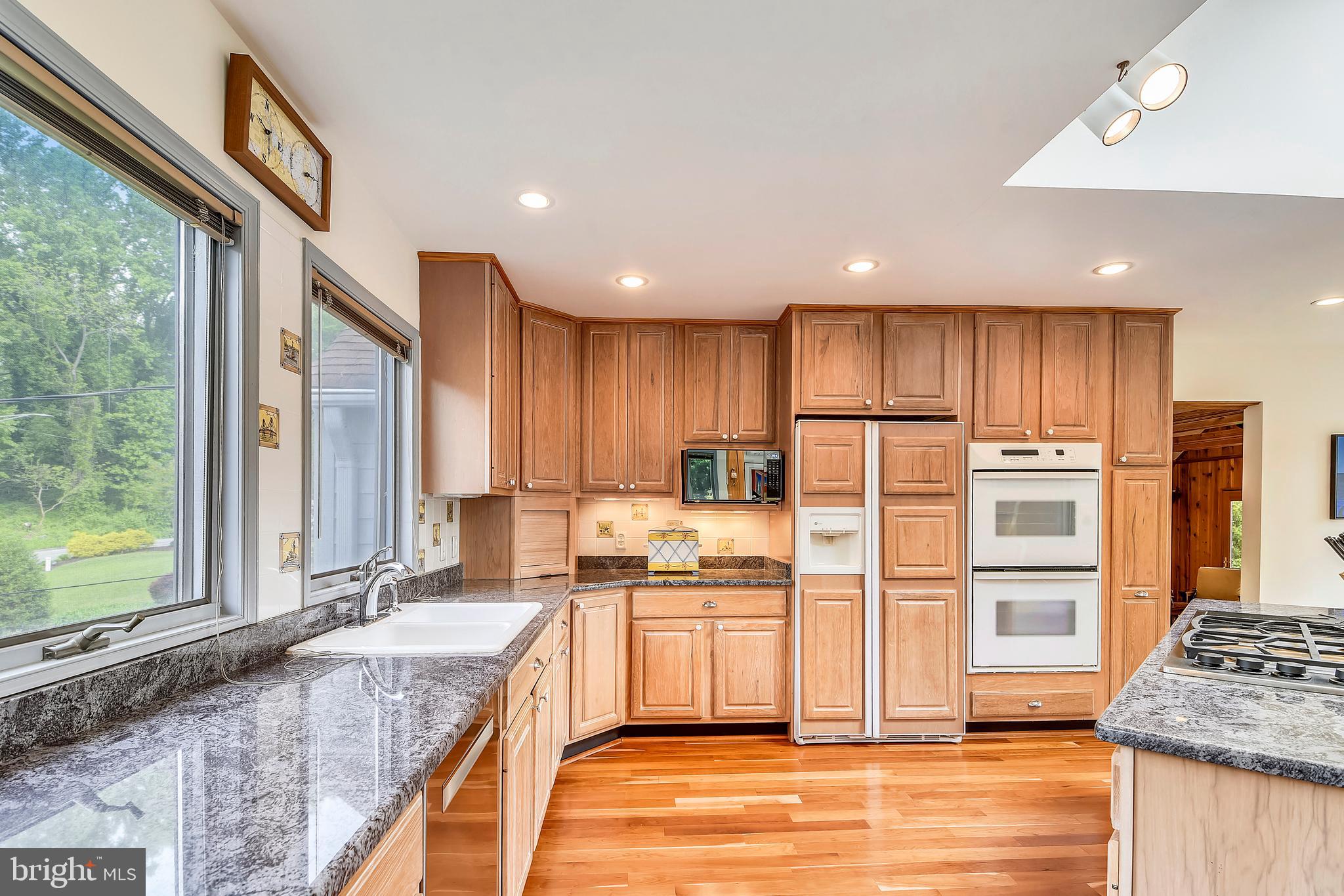 1059 Trails End Road Pasadena, MD 21122 - Photo 6 of 51 Granite and Hardwood in kitchen