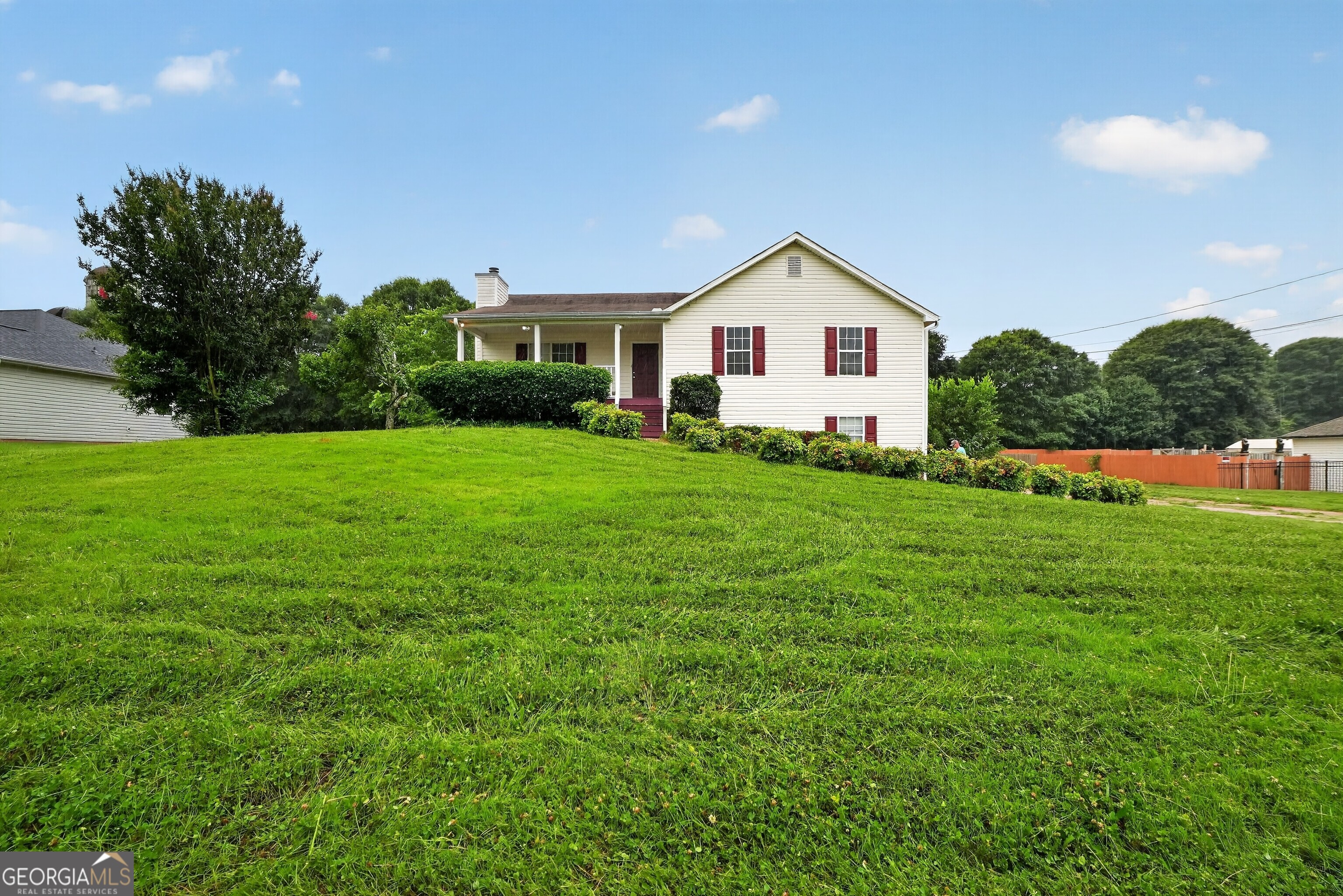 75 Linsley Way Covington, GA 30016 - Photo 5 of 48 a front view of a house with yard