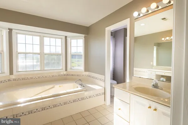 a view of a lake with a yard