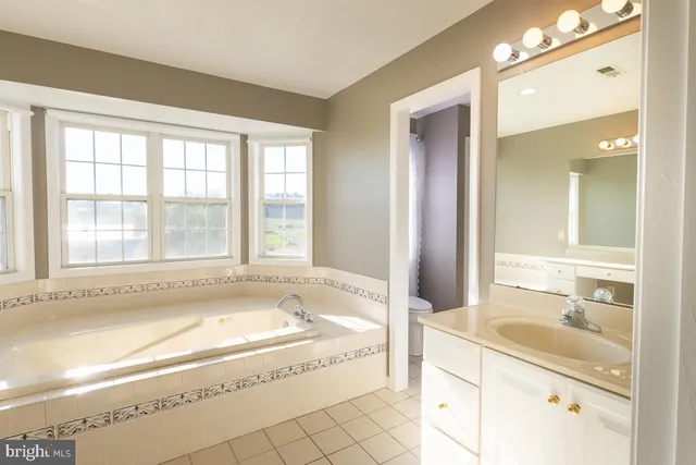 a view of a lake with a yard