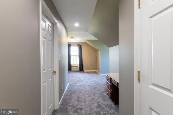 a view of a house with porch and wooden floor