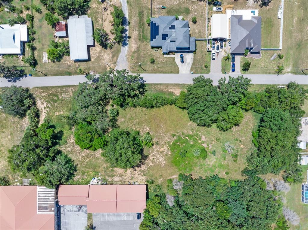 8th Street Montverde, FL 34756 - Photo 12 of 19 an aerial view of a house with a yard basket ball court and outdoor seating
