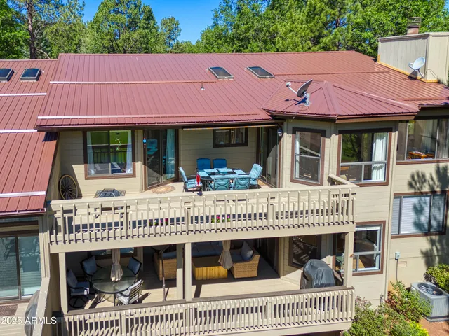 a view of a house with a balcony and window