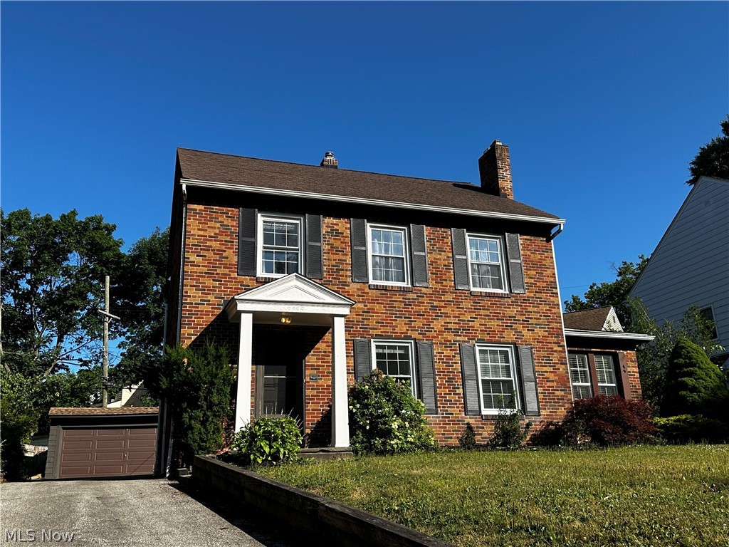 2255 Edgerton Road University Heights, OH 44118 - Photo 1 of 33 Colonial inspired home with a garage and a front yard