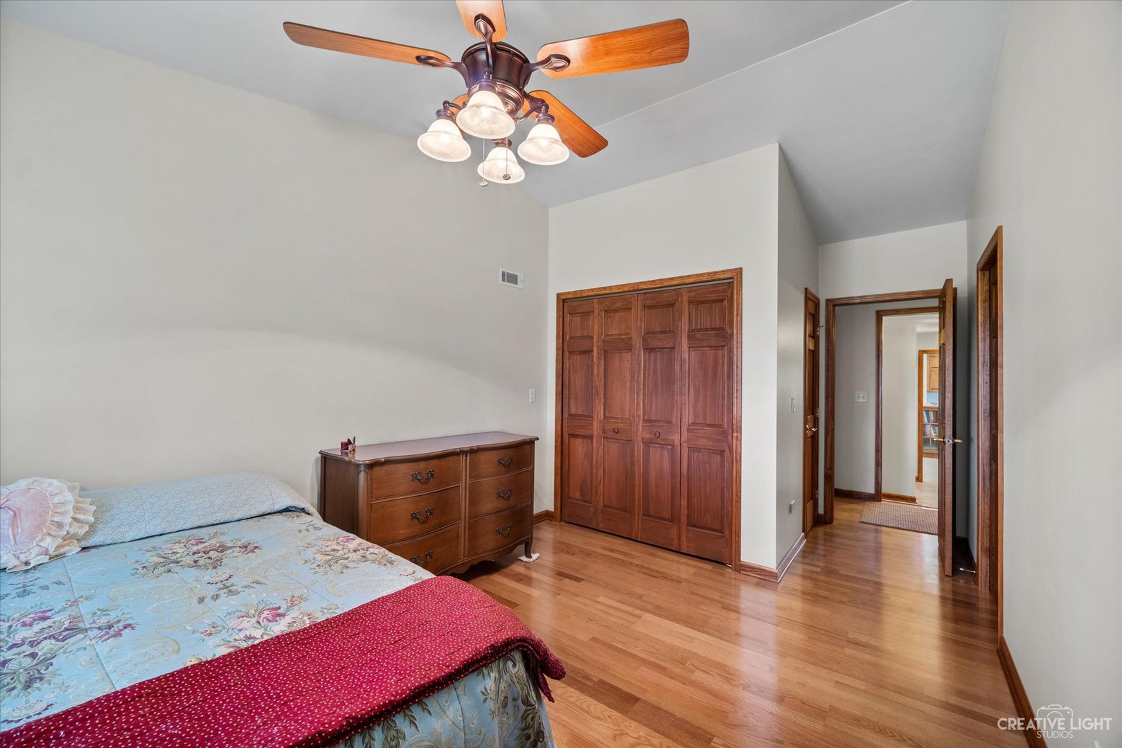 2075 North 4071st Road Sheridan, IL 60551 - Photo 14 of 22 a bedroom with a bed and wooden floor