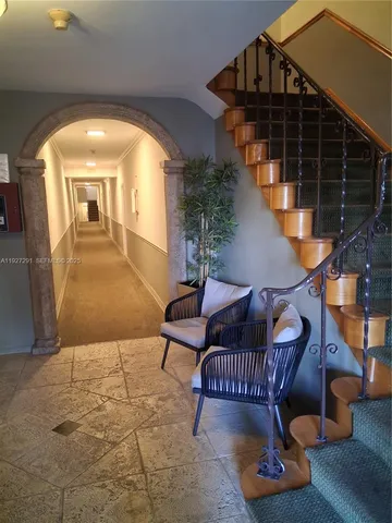 a view of balcony with furniture