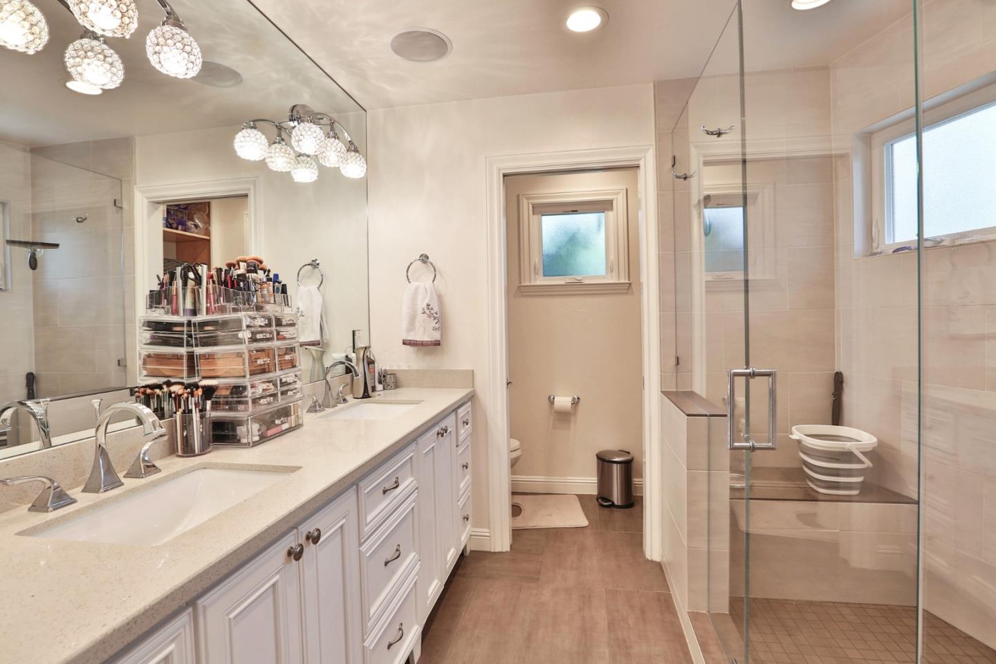 1053 Wallace Drive San Jose, CA 95120 - Photo 19 of 36 a bathroom with a double vanity sink mirror and double