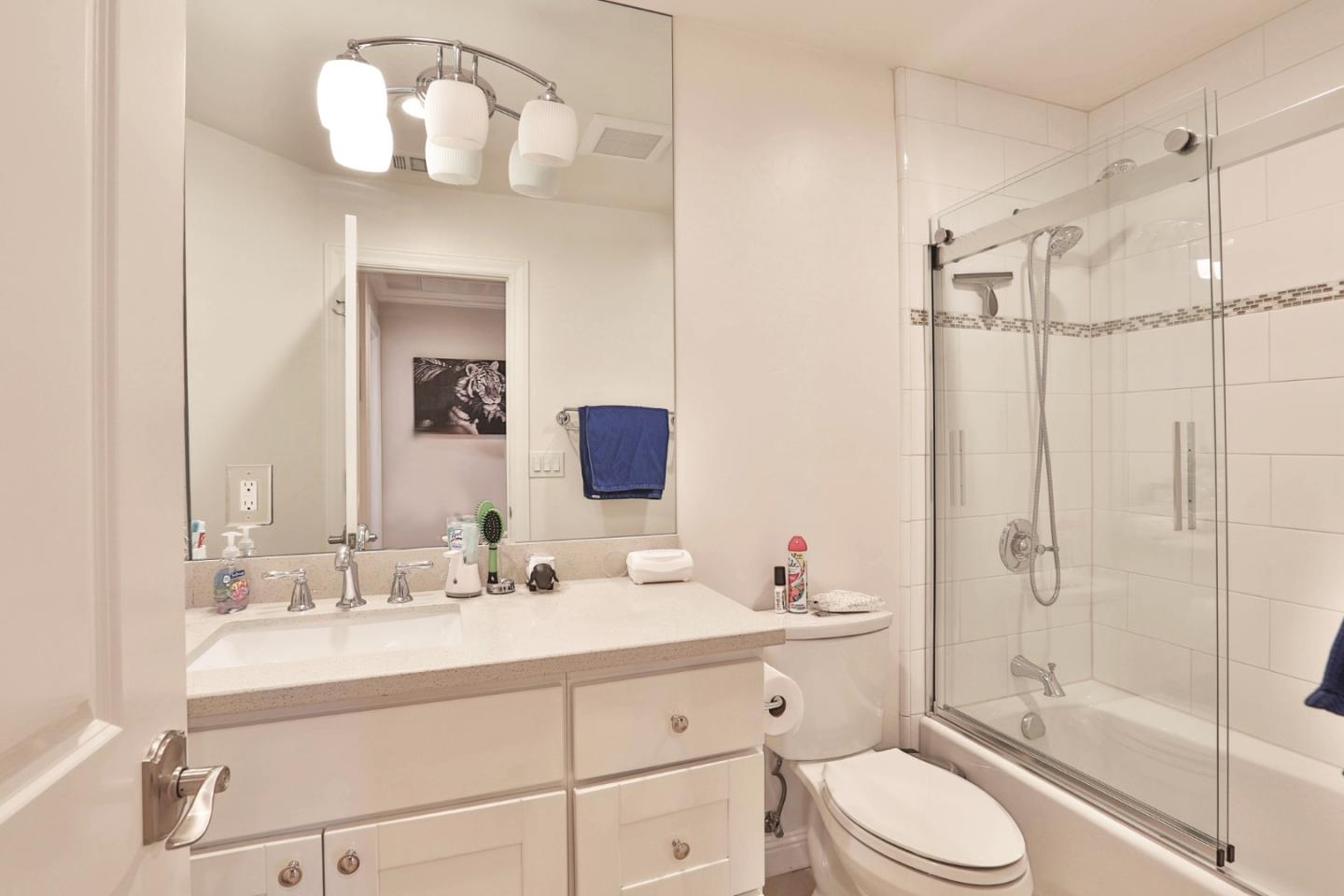 1053 Wallace Drive San Jose, CA 95120 - Photo 21 of 36 a bathroom with a sink a toilet and shower