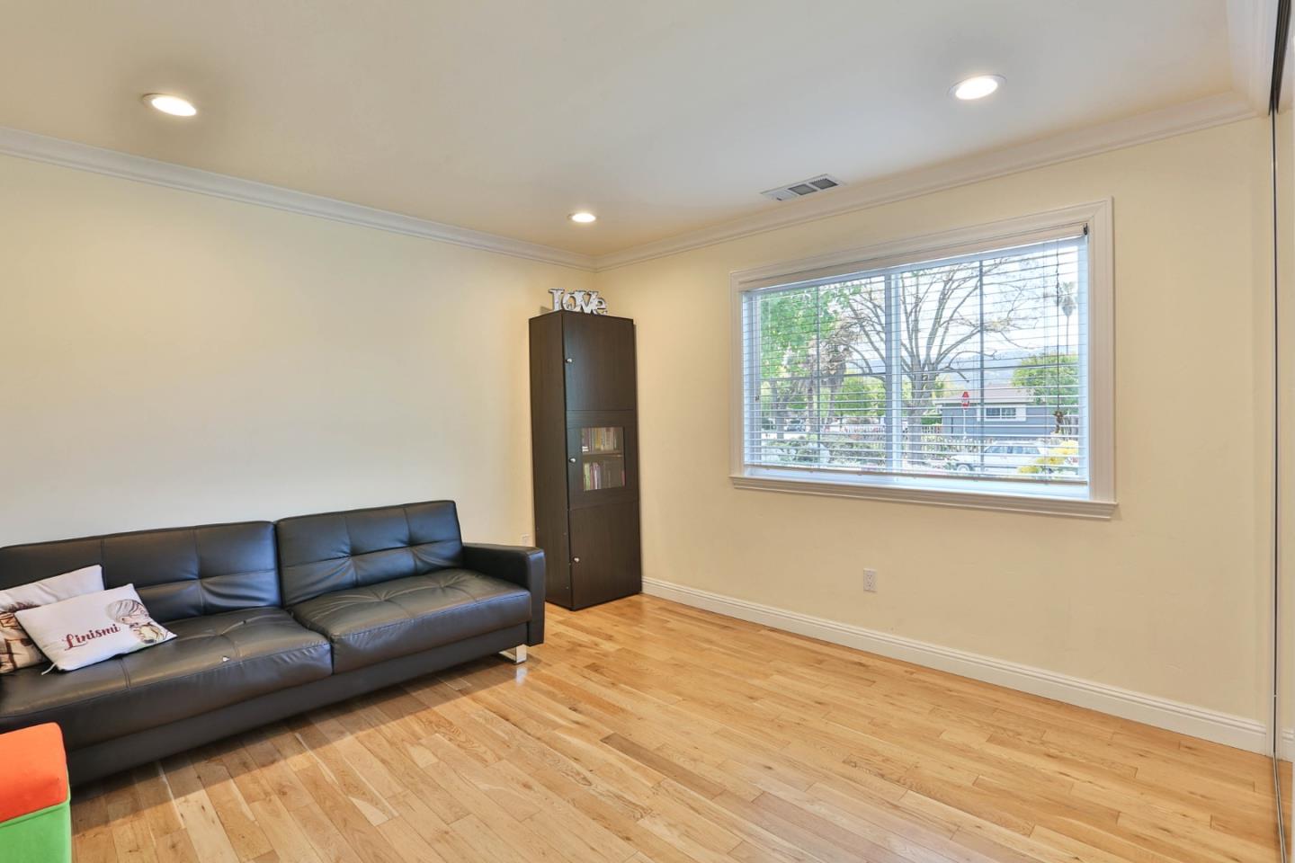 1053 Wallace Drive San Jose, CA 95120 - Photo 22 of 36 a living room with furniture and a window