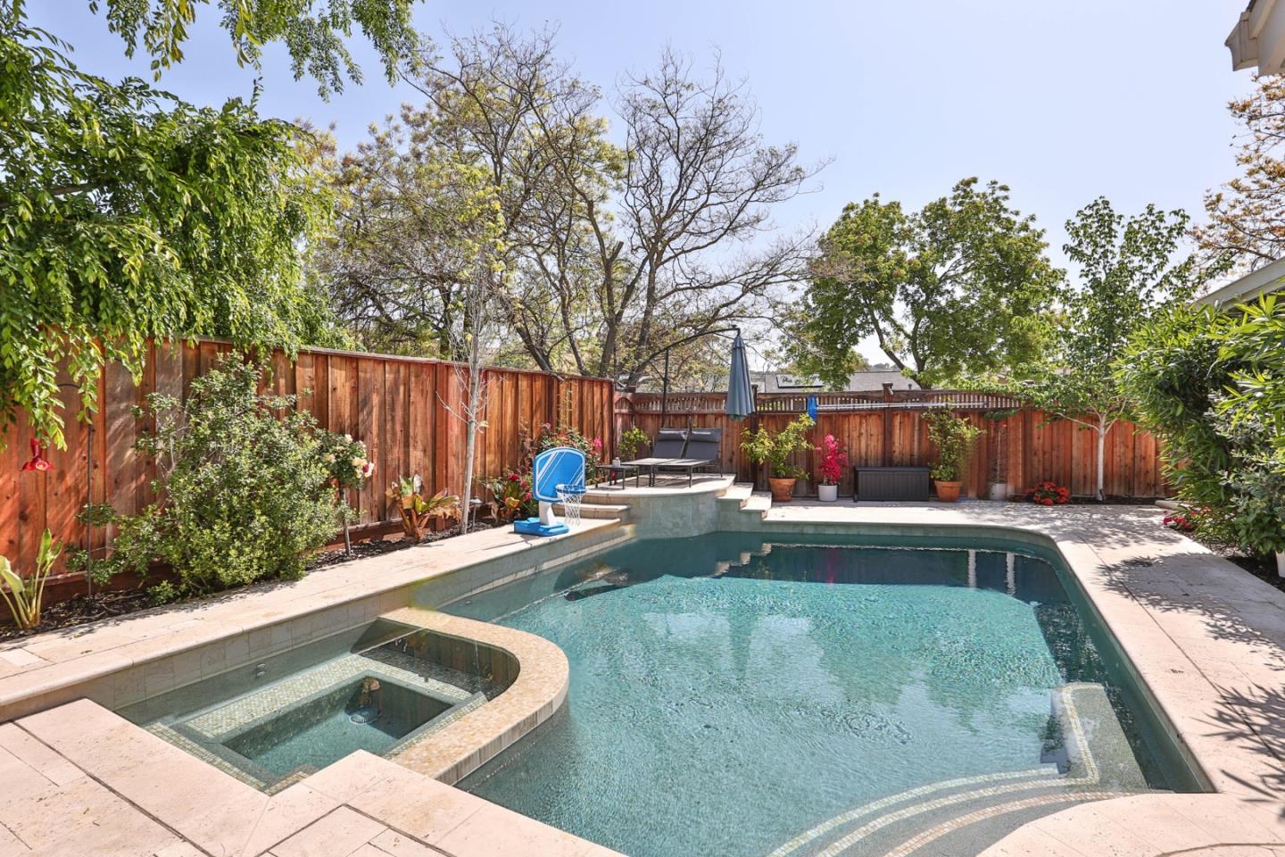 1053 Wallace Drive San Jose, CA 95120 - Photo 27 of 36 a view of backyard with swimming pool and outdoor seating