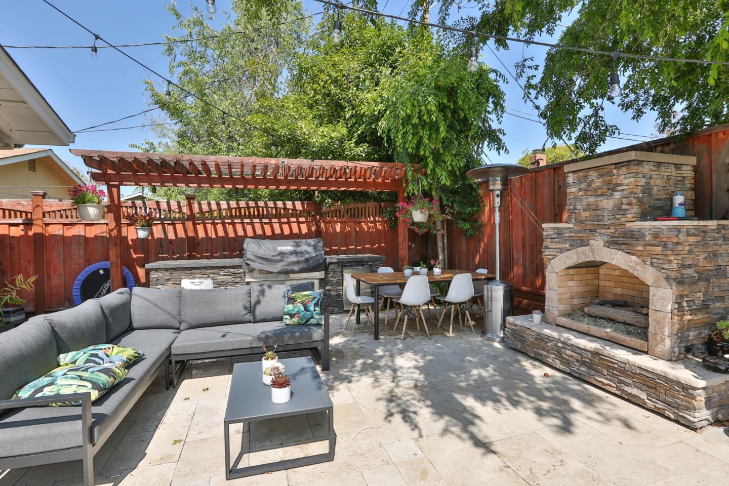 1053 Wallace Drive San Jose, CA 95120 - Photo 29 of 36 a outdoor living space with patio furniture and a fireplace