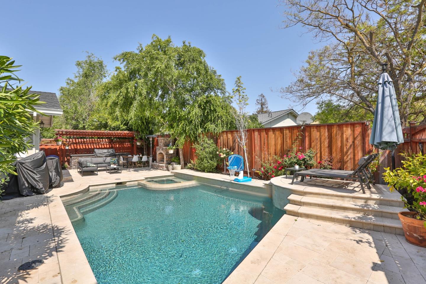 1053 Wallace Drive San Jose, CA 95120 - Photo 30 of 36 a view of a backyard with sitting area