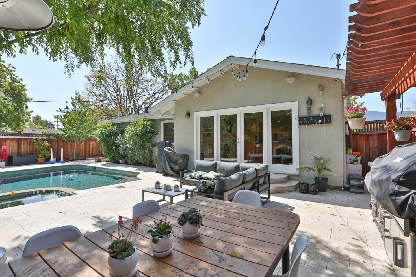 1053 Wallace Drive San Jose, CA 95120 - Photo 31 of 36 a view of a house with backyard and sitting area