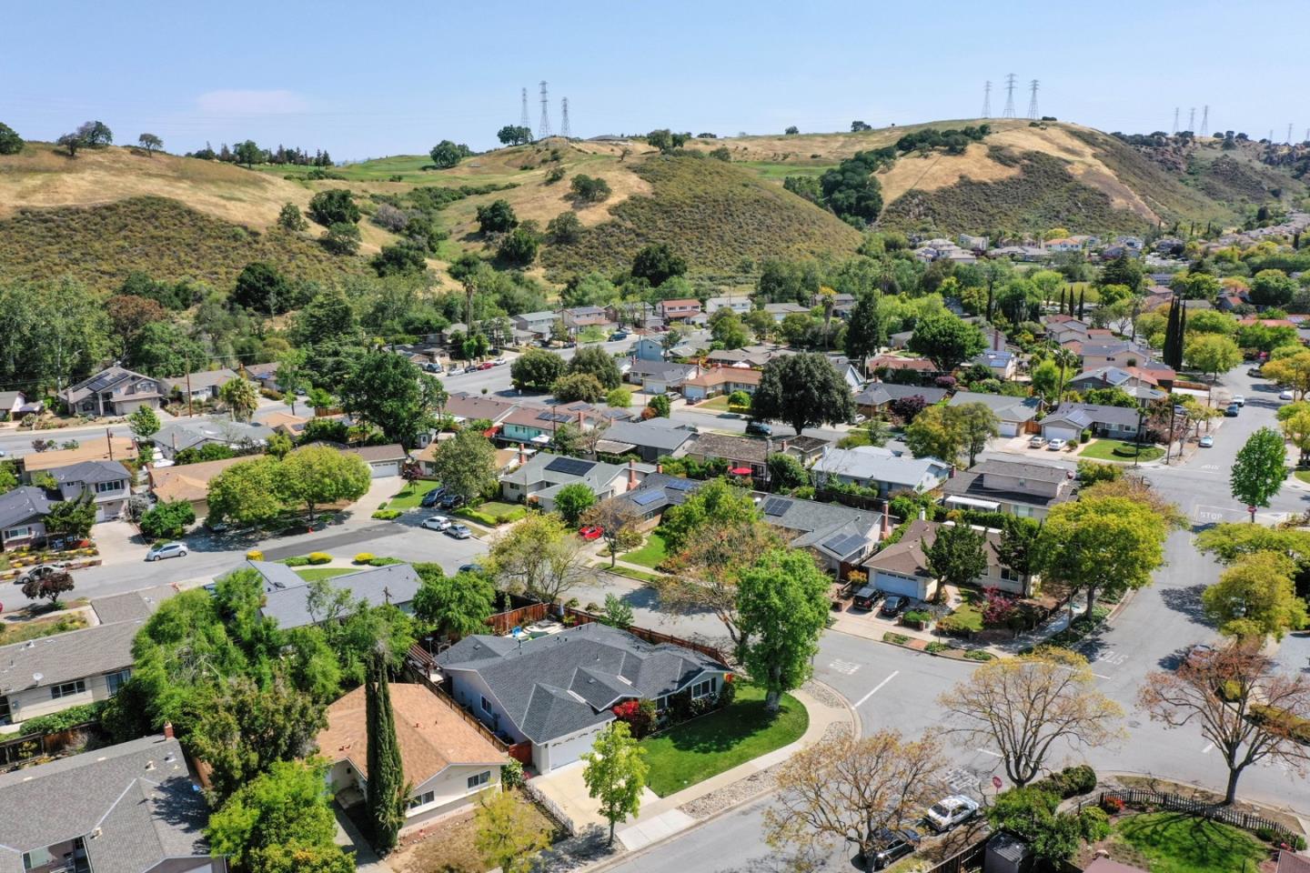 1053 Wallace Drive San Jose, CA 95120 - Photo 9 of 36 an aerial view of residential houses with outdoor space and trees