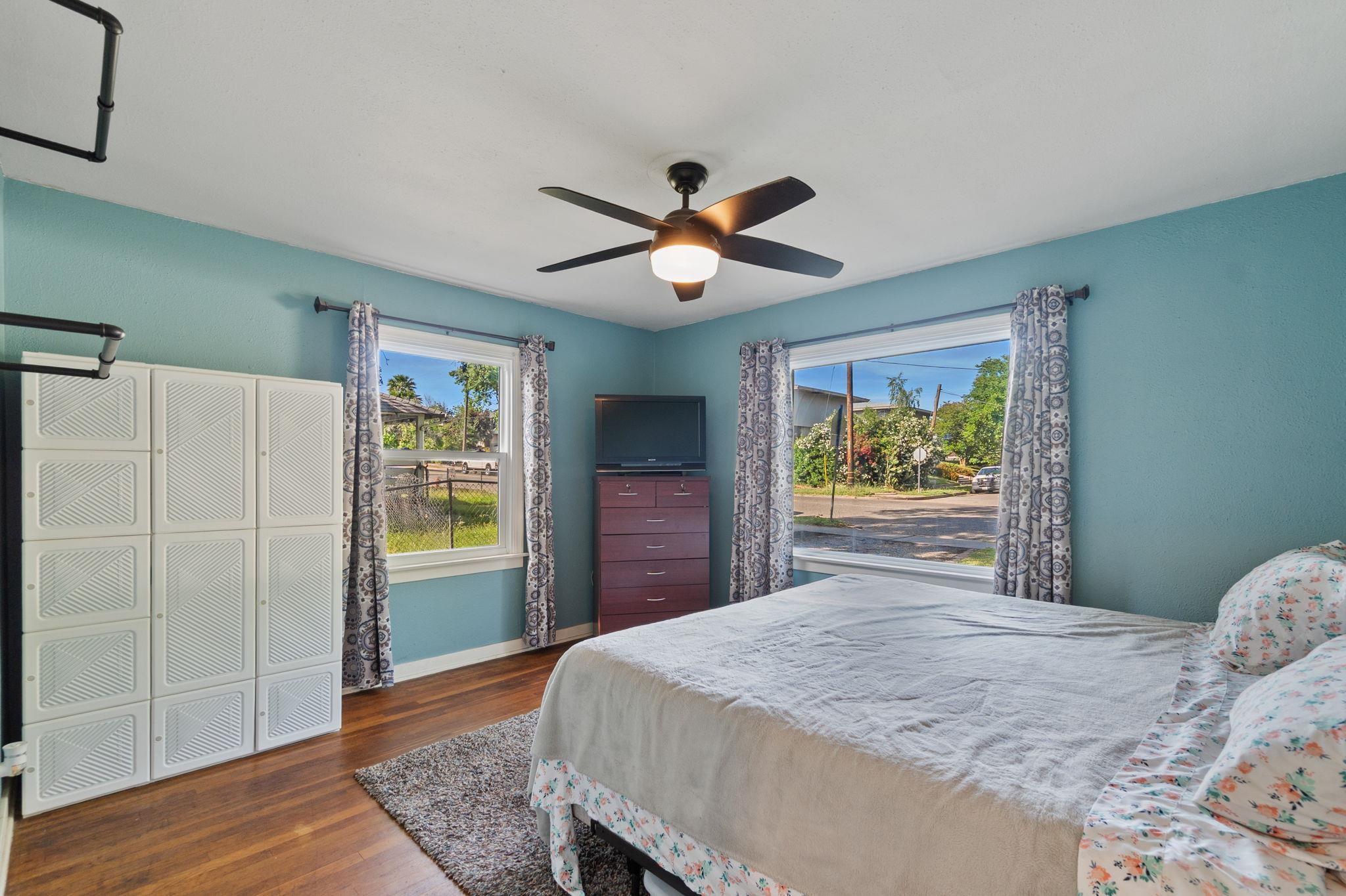 355 Jackson Street Red Bluff, CA 96080 - Photo 9 of 24 a bedroom with a bed and a window