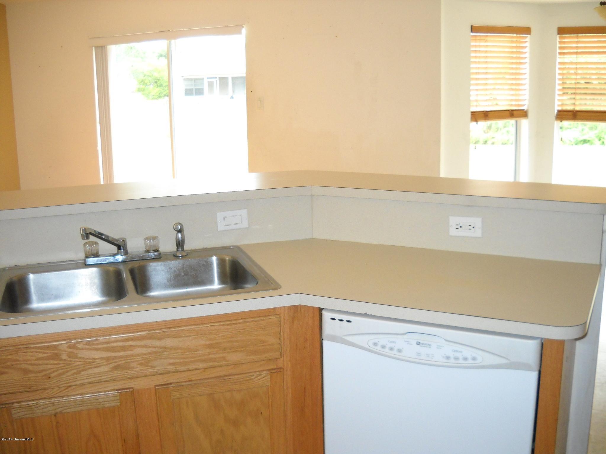 4475 Kings Highway Cocoa, FL 32927 - Photo 4 of 14 Kitchen breakfast bar view