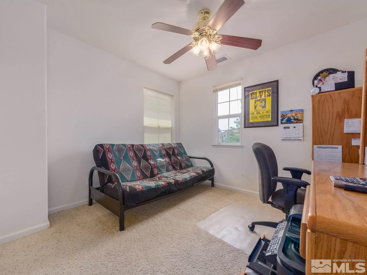545 Luciana Drive Reno, NV 89521 - Photo 18 of 24 a living room with furniture and a window