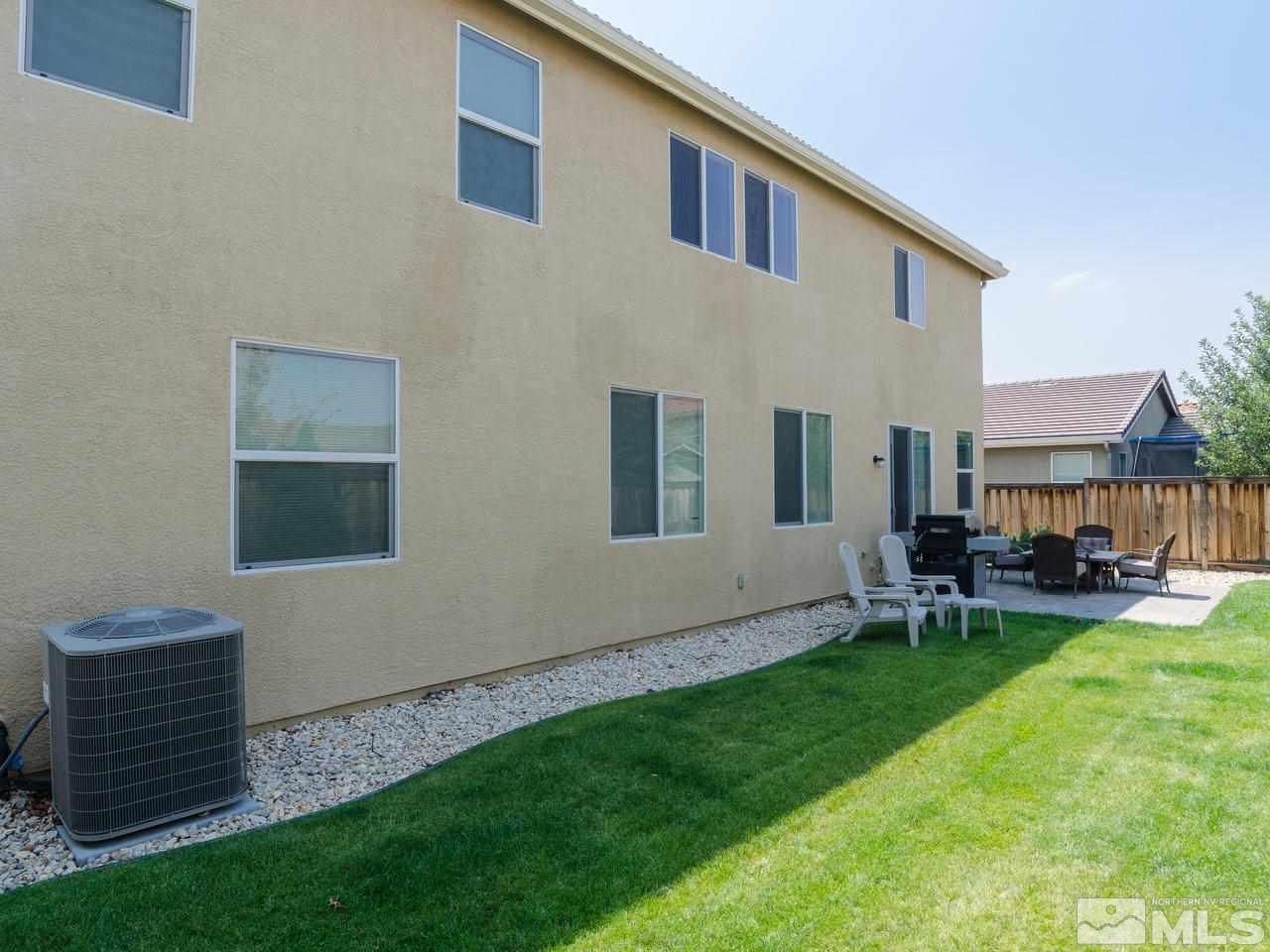 545 Luciana Drive Reno, NV 89521 - Photo 24 of 24 a view of a house with a yard and sitting area