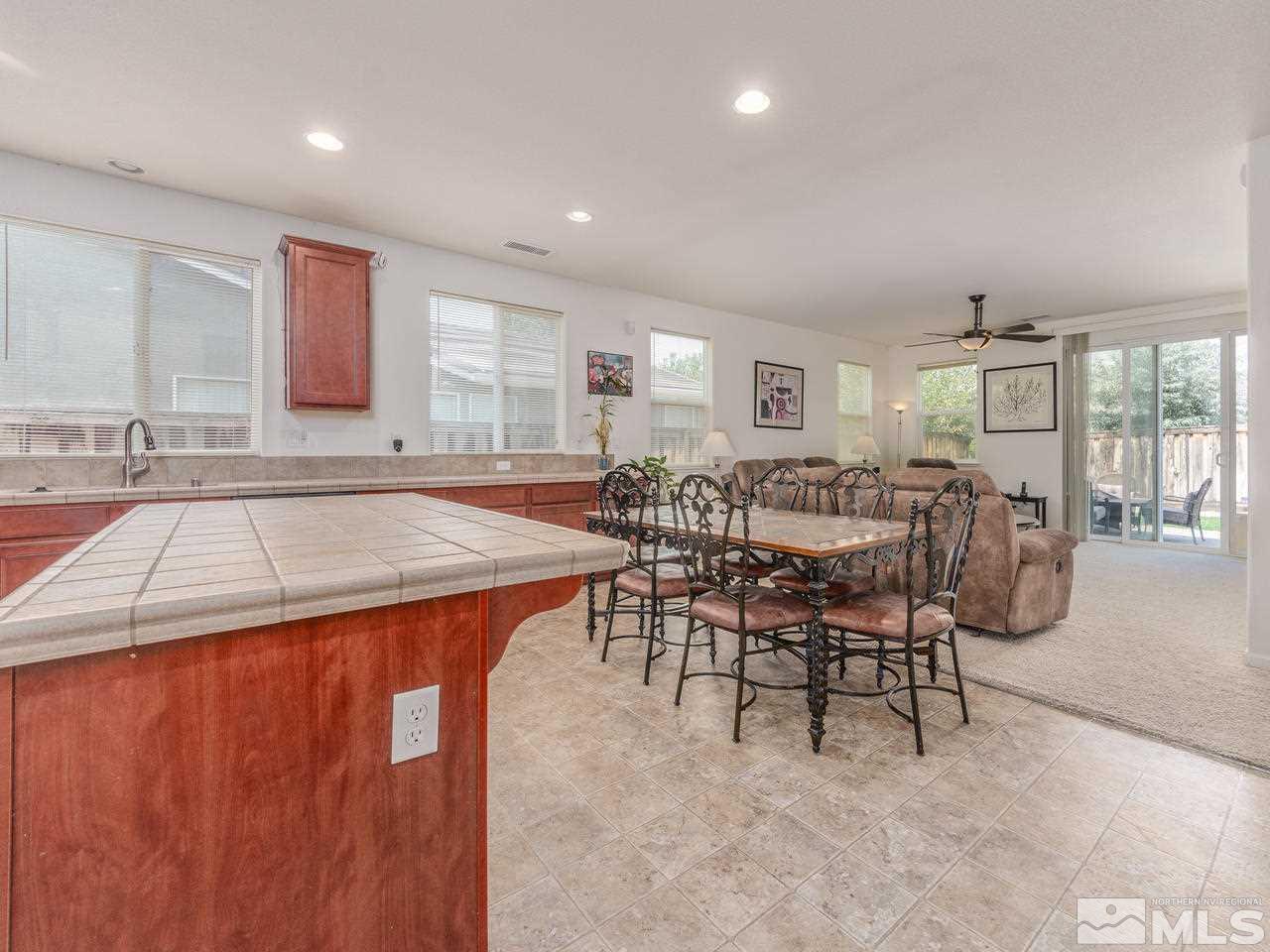 545 Luciana Drive Reno, NV 89521 - Photo 8 of 24 a dinning area with pool table and chairs