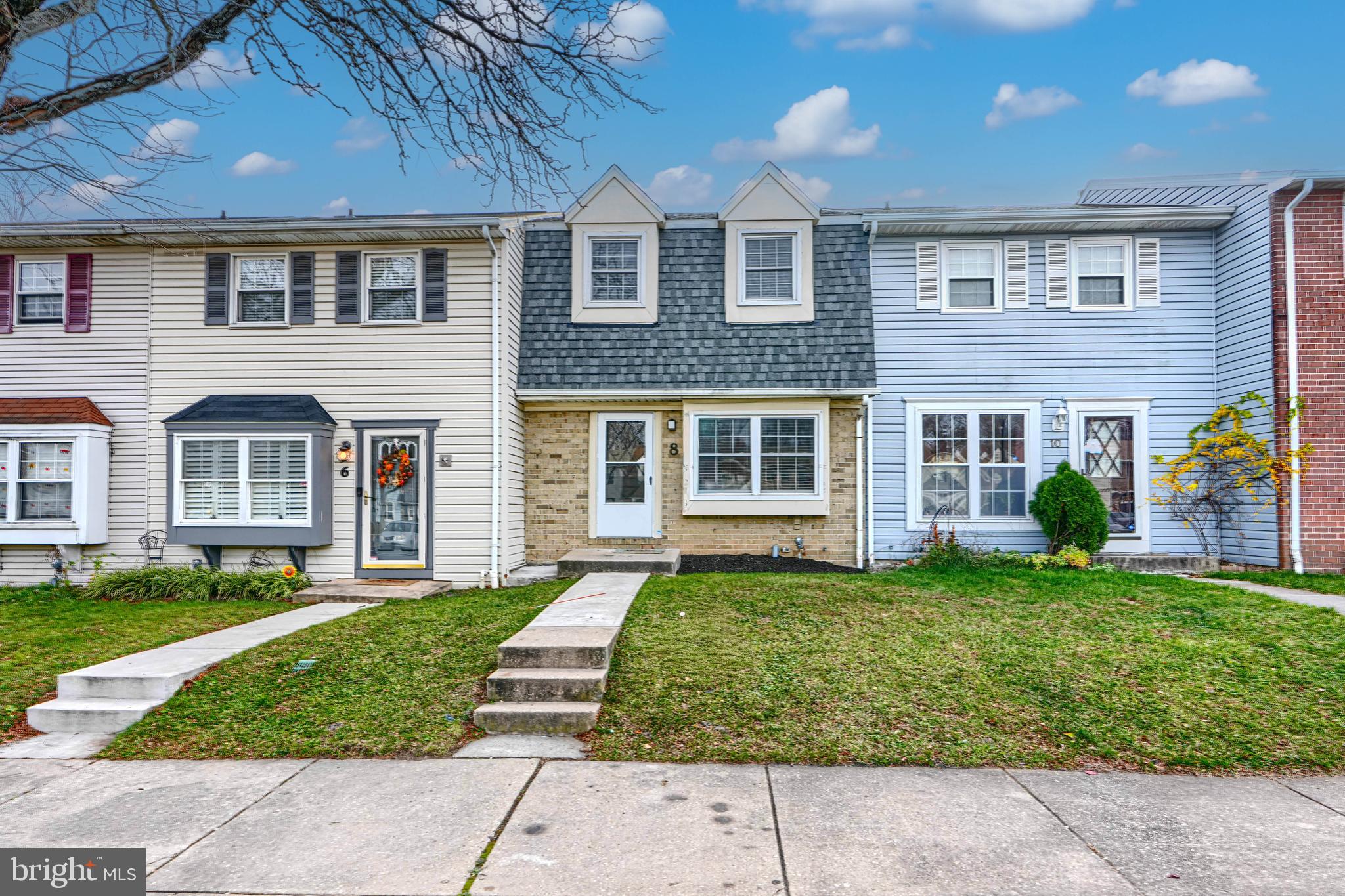 8 King Richard Court, Unit 8 Rosedale, MD 21237 - Photo 2 of 41 a front view of a house with a yard