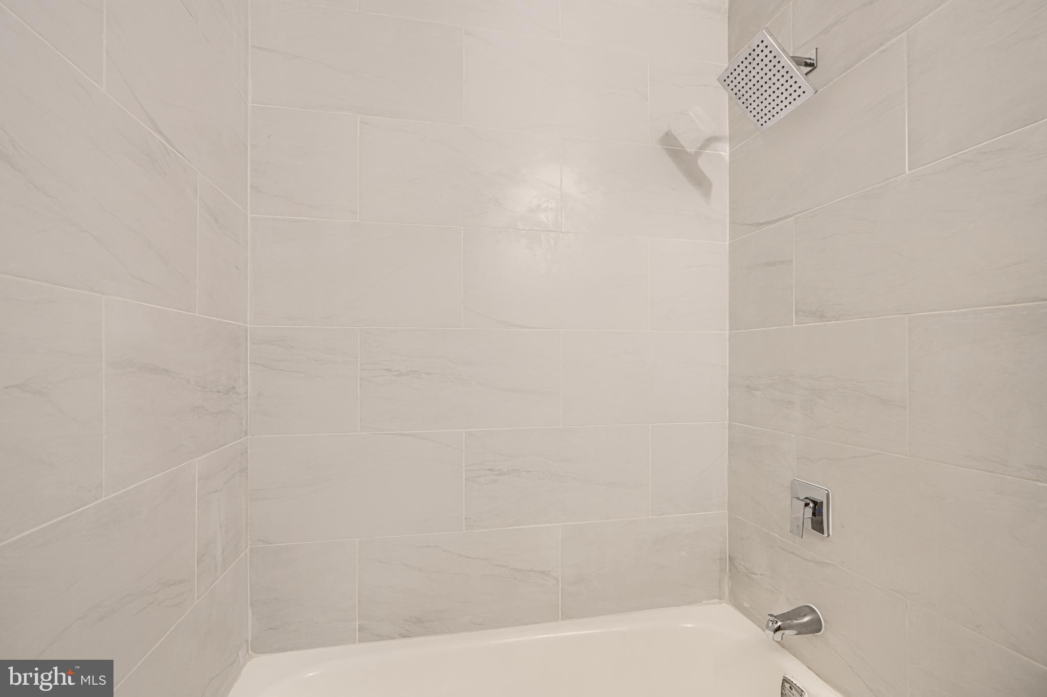 8 King Richard Court, Unit 8 Rosedale, MD 21237 - Photo 24 of 41 a bathroom with a bathtub