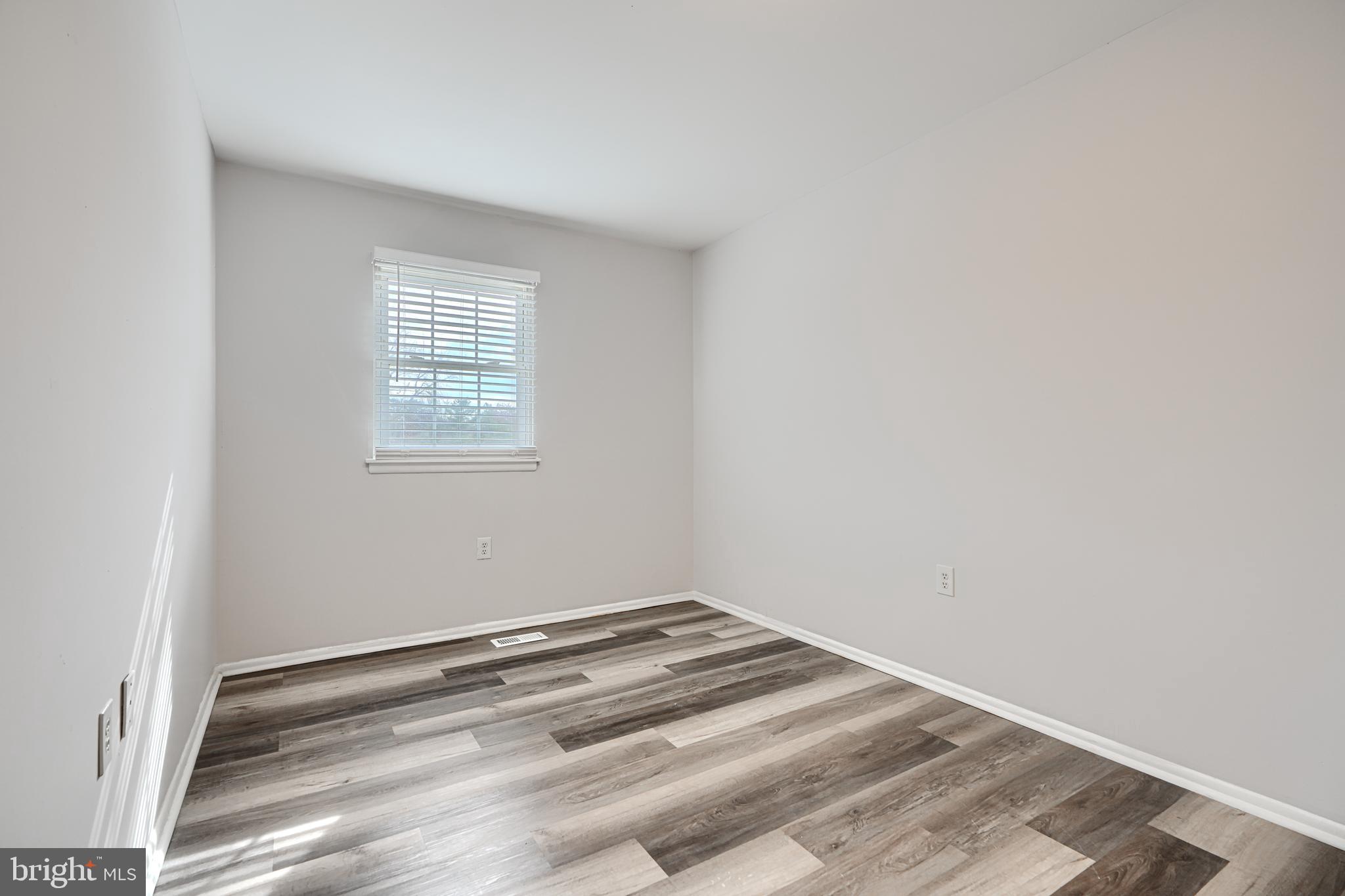 8 King Richard Court, Unit 8 Rosedale, MD 21237 - Photo 26 of 41 an empty room with a window