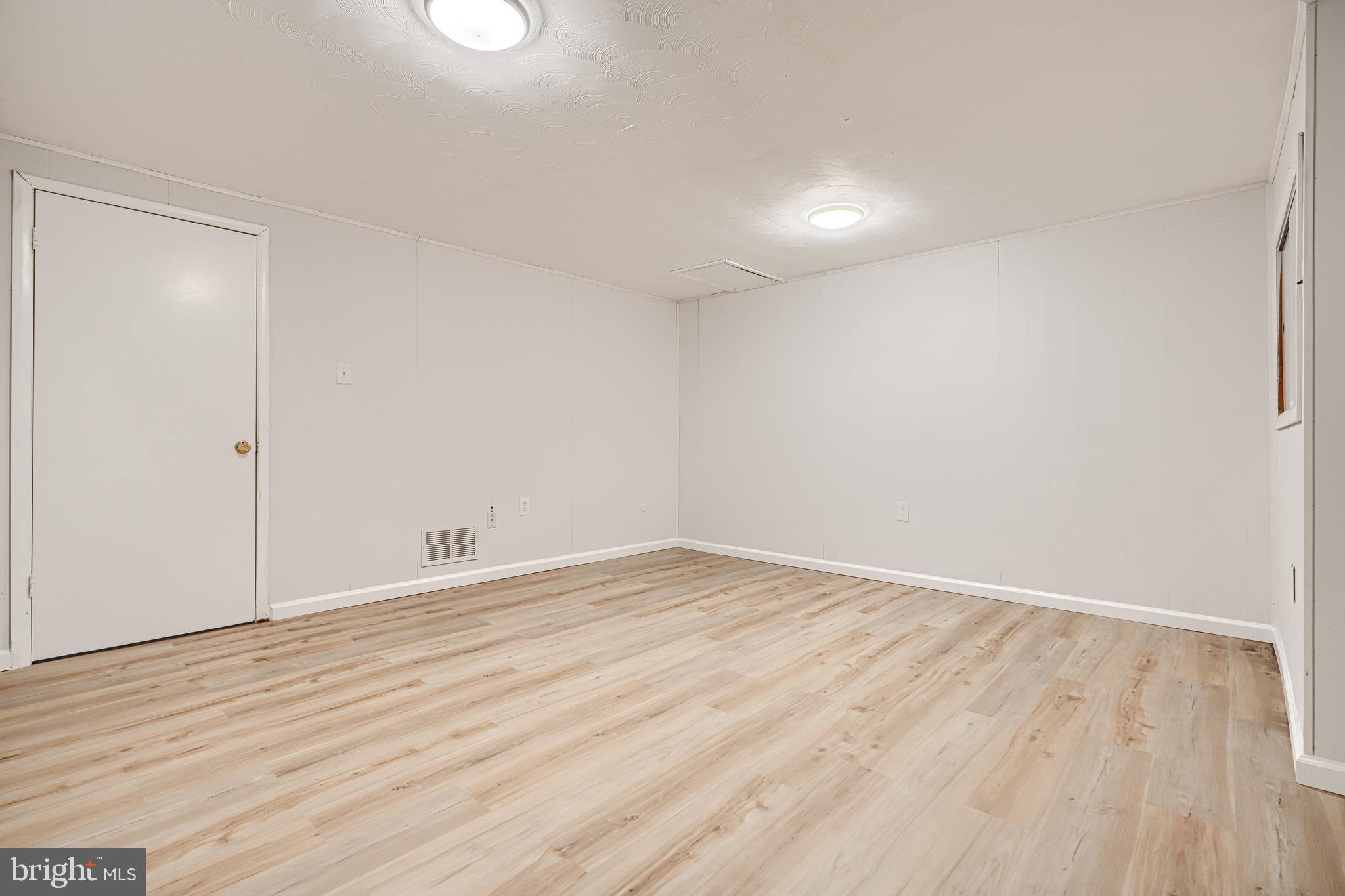 8 King Richard Court, Unit 8 Rosedale, MD 21237 - Photo 33 of 41 wooden floor in a room