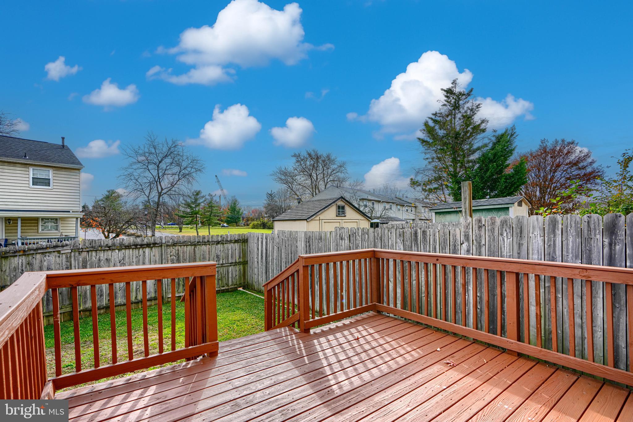 8 King Richard Court, Unit 8 Rosedale, MD 21237 - Photo 40 of 41 a balcony with wooden floor