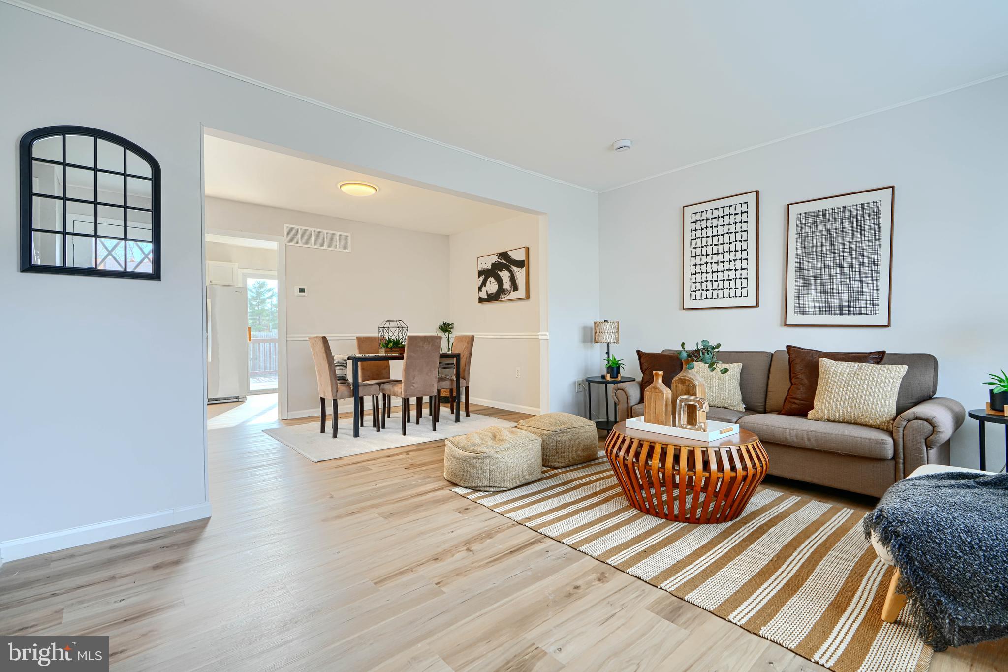 8 King Richard Court, Unit 8 Rosedale, MD 21237 - Photo 5 of 41 a living room with furniture and wooden floor