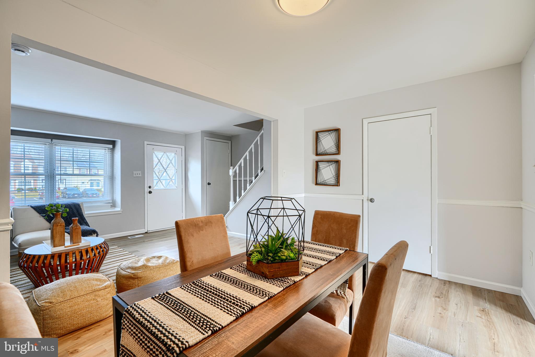 8 King Richard Court, Unit 8 Rosedale, MD 21237 - Photo 8 of 41 a living room with furniture and wooden floor