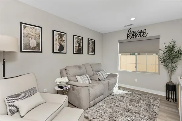 a living room with furniture and window