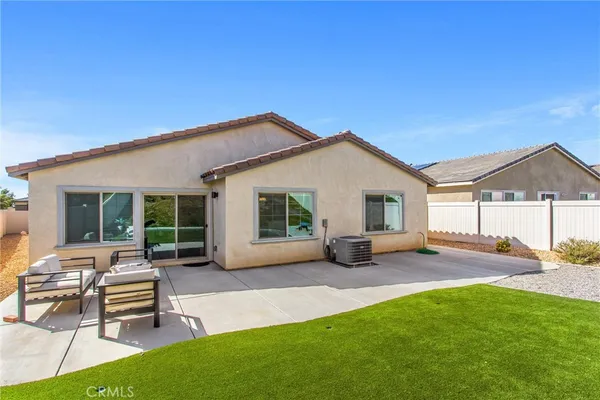 a view of a house with a patio