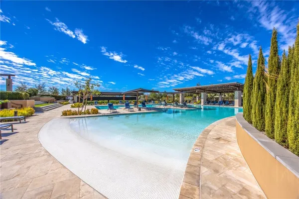 a view of a swimming pool with a patio
