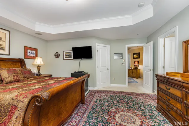 a bedroom with a bed and furniture