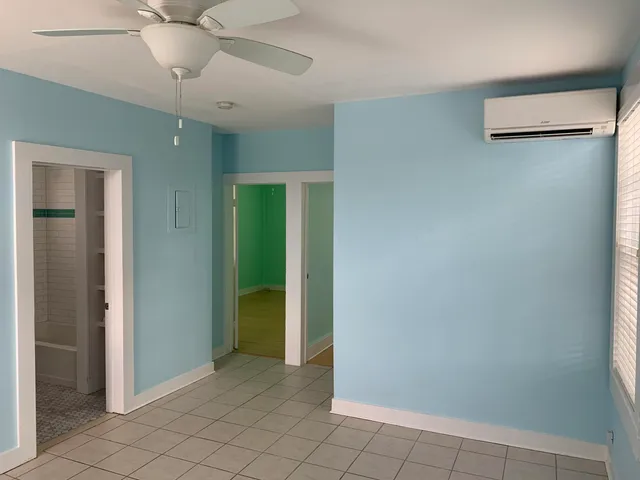 an empty room with windows