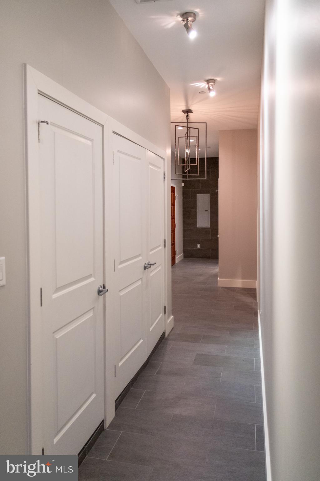 20 Letitia Street, Unit 3B Philadelphia, PA 19106 - Photo 17 of 35 a view of a hallway with wooden shelves
