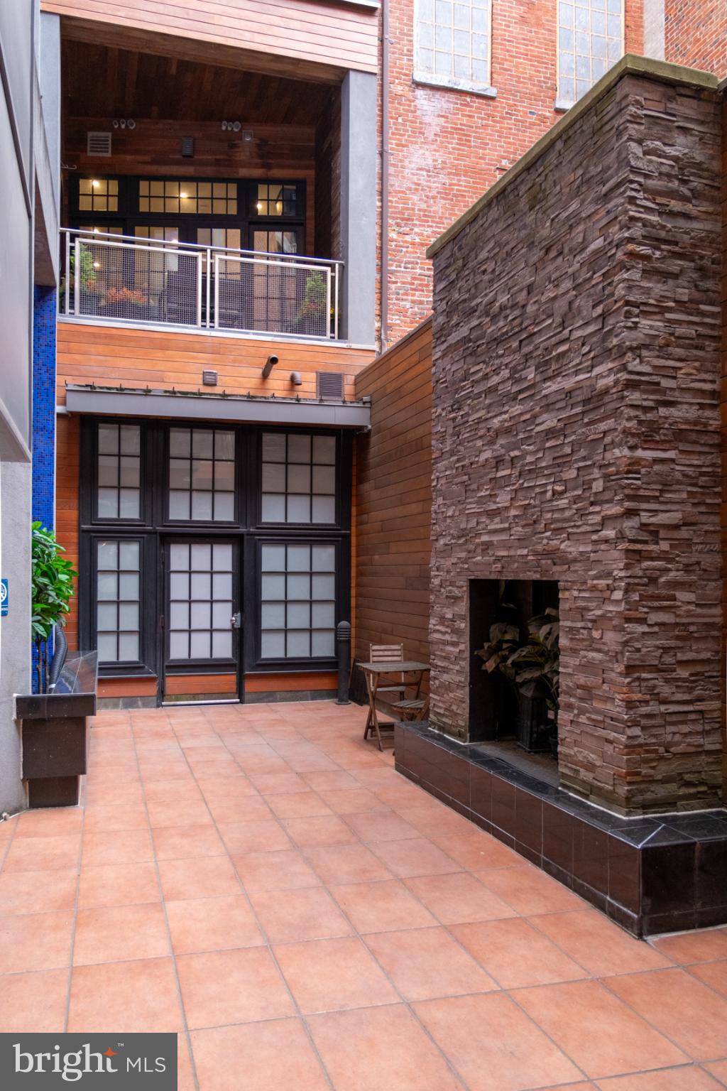 20 Letitia Street, Unit 3B Philadelphia, PA 19106 - Photo 26 of 35 a backyard of a house with dishwasher and outdoor seating