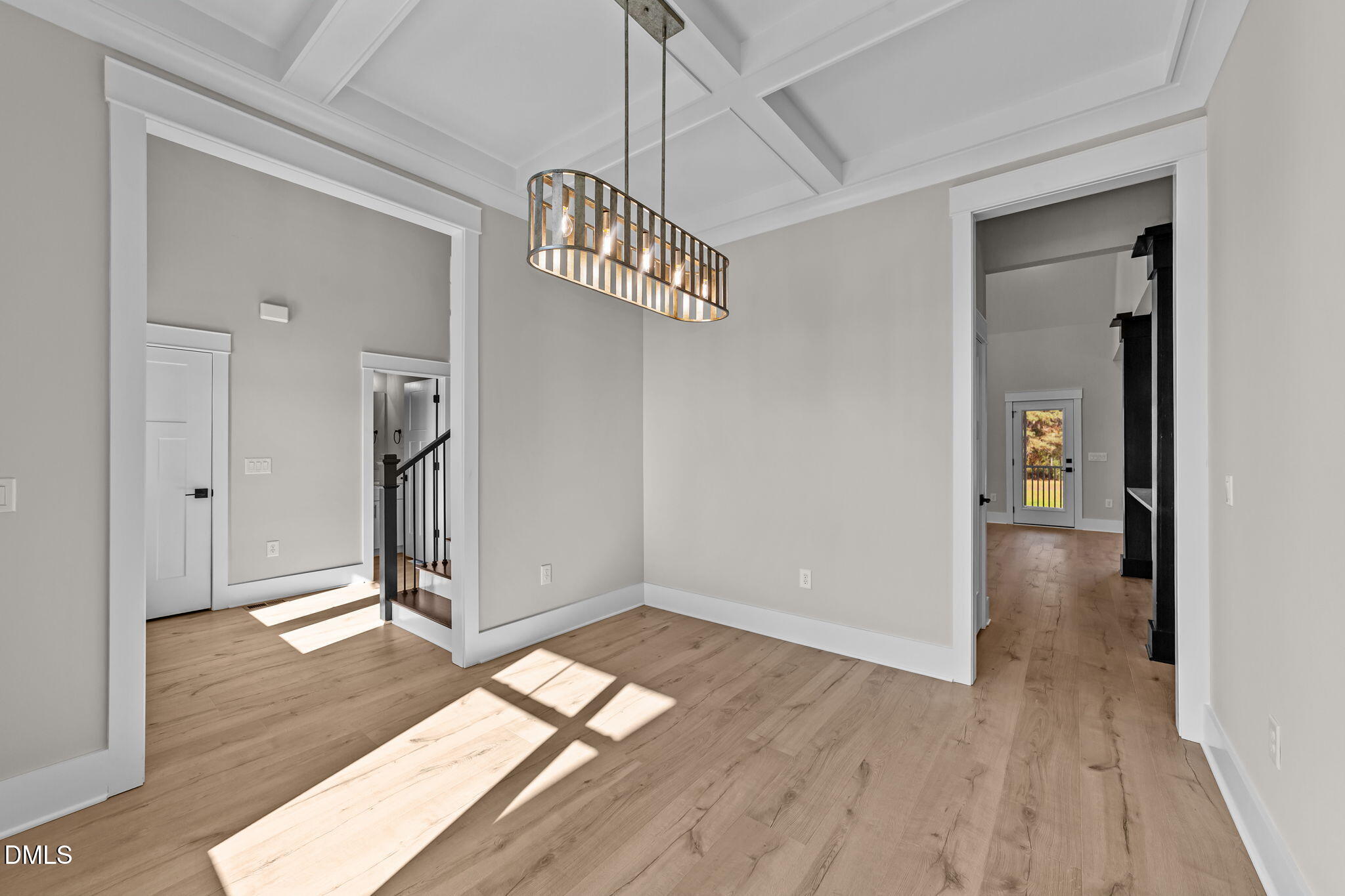 2568 Lassiter Road Four Oaks, NC 27524 - Photo 13 of 50 wooden floor in an empty room with a window