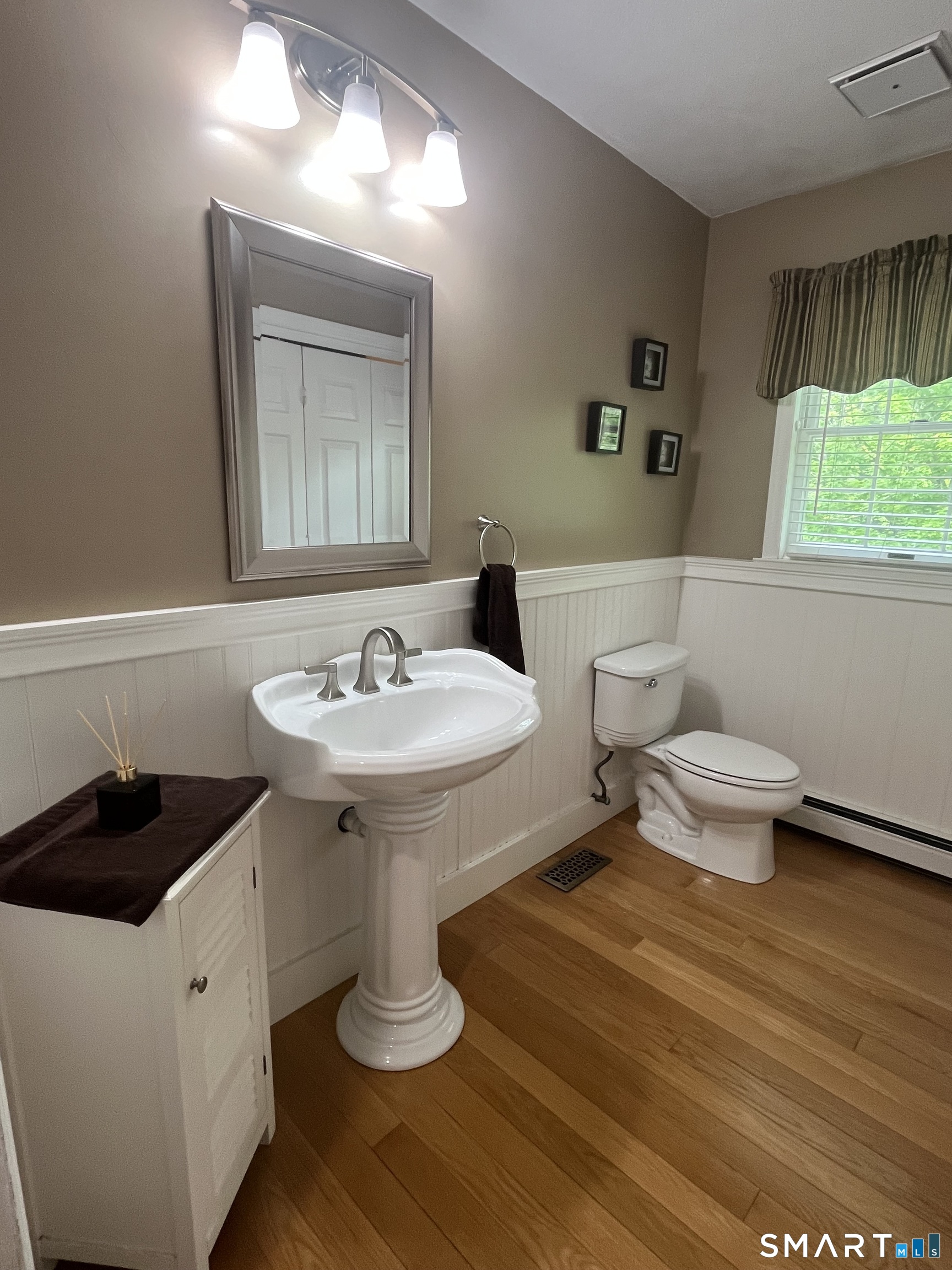 47 Merwin Brook Road Brookfield, CT 06804 - Photo 10 of 29 a bathroom with a sink and a toilet