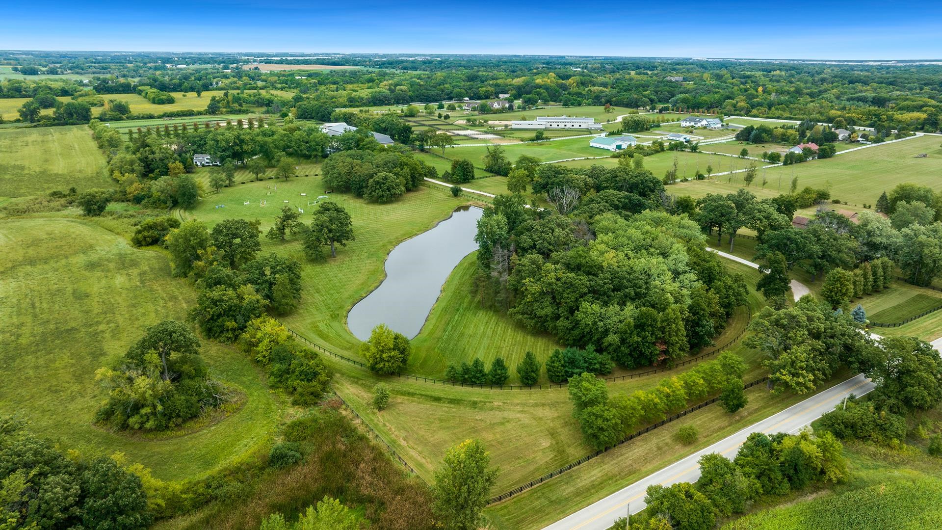 18752 West Edwards Road Antioch, IL 60002 - Photo 24 of 59 a view of a city with lush green forest