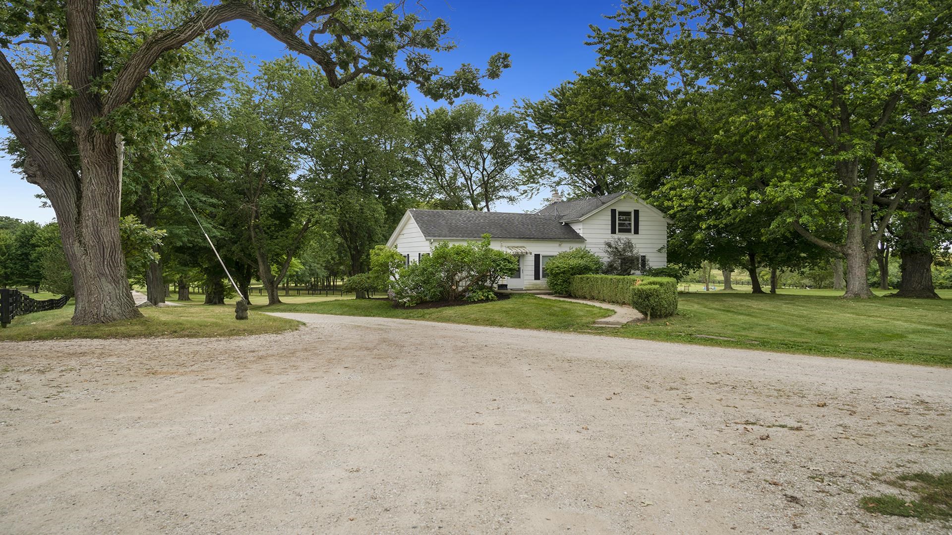 18752 West Edwards Road Antioch, IL 60002 - Photo 29 of 59 a view of a house with a yard and large trees