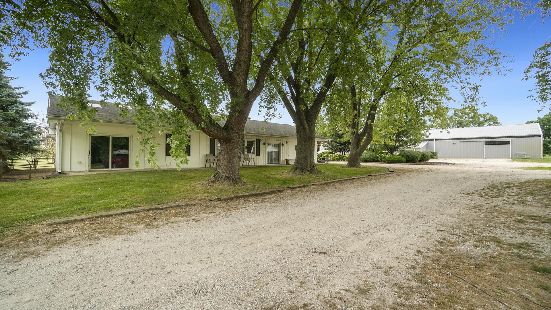 18752 West Edwards Road Antioch, IL 60002 - Photo 30 of 59 a front view of a house with a yard and trees