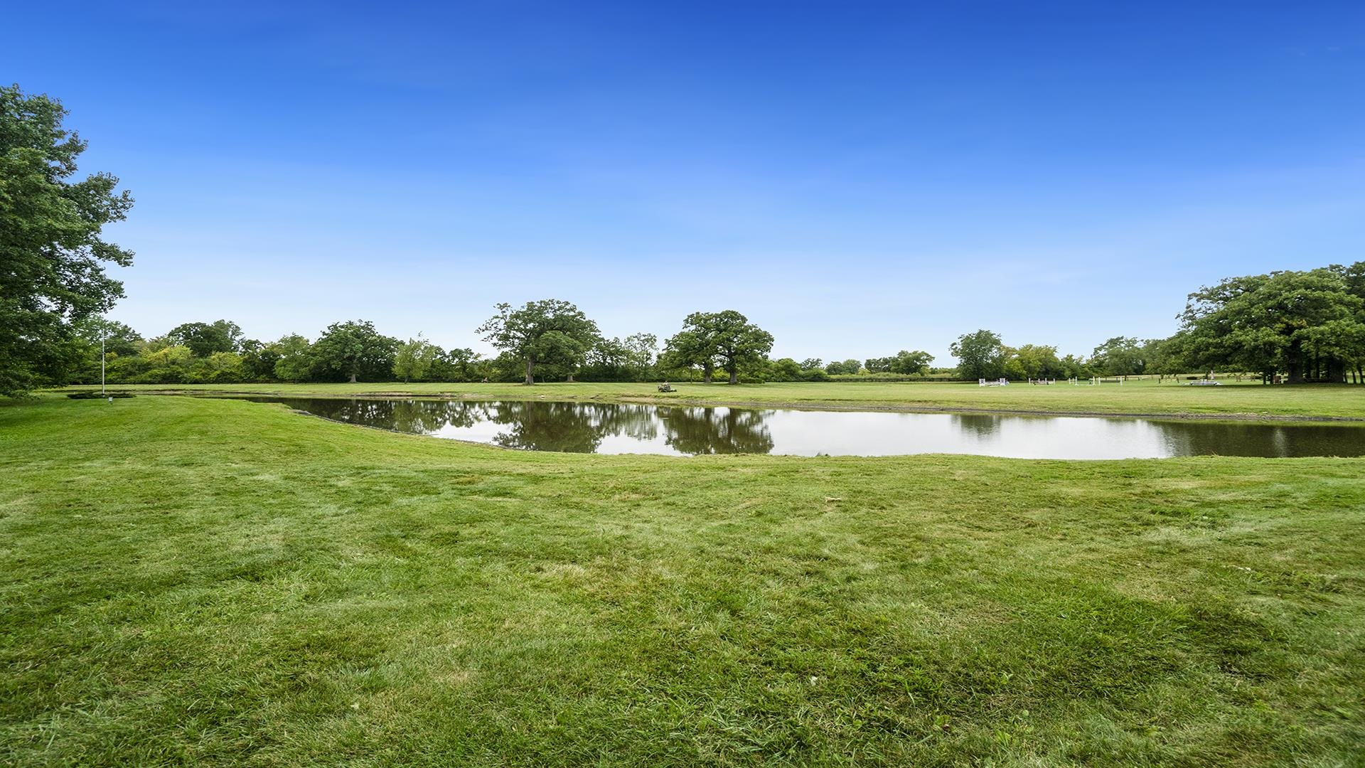 18752 West Edwards Road Antioch, IL 60002 - Photo 31 of 59 a view of a lake with houses in the background